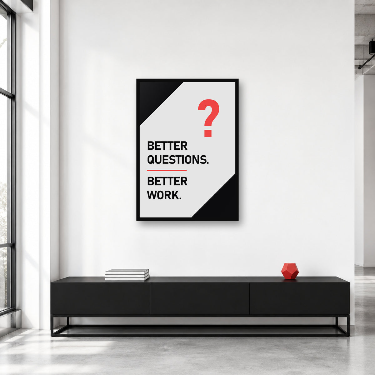 Better Questions Better Work wall art styled in a creative studio