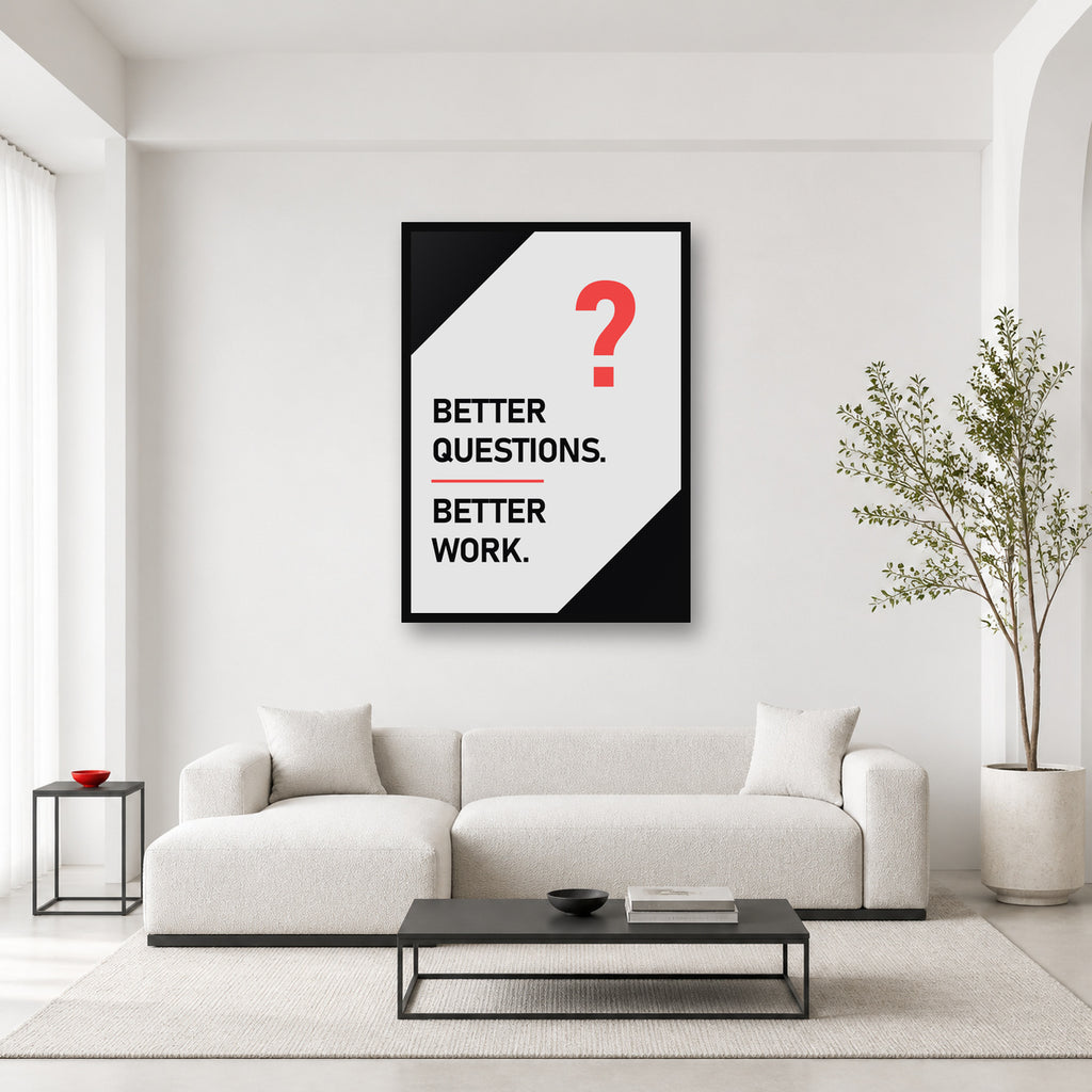 Better Questions Better Work wall art styled in a bright editorial office