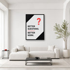 Better Questions Better Work wall art styled in a bright editorial office
