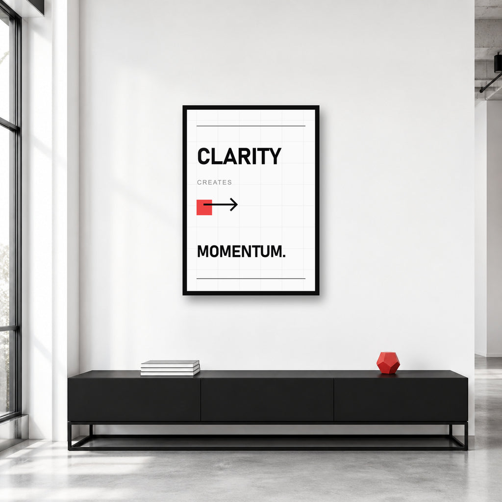 Clarity Creates Momentum wall art styled in a creative studio