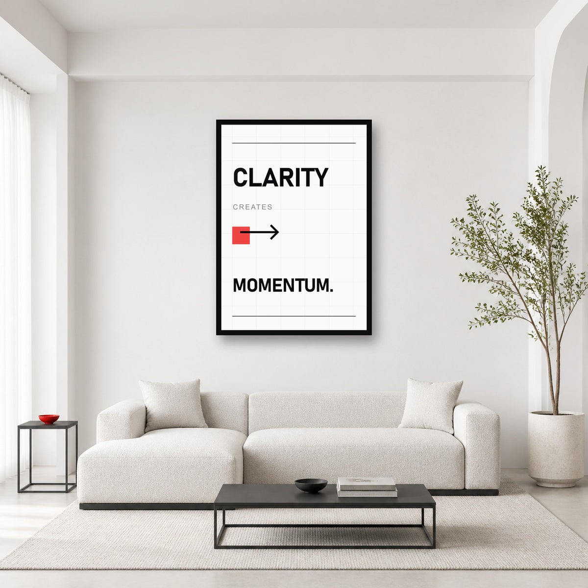 Clarity Creates Momentum wall art styled in a bright editorial office